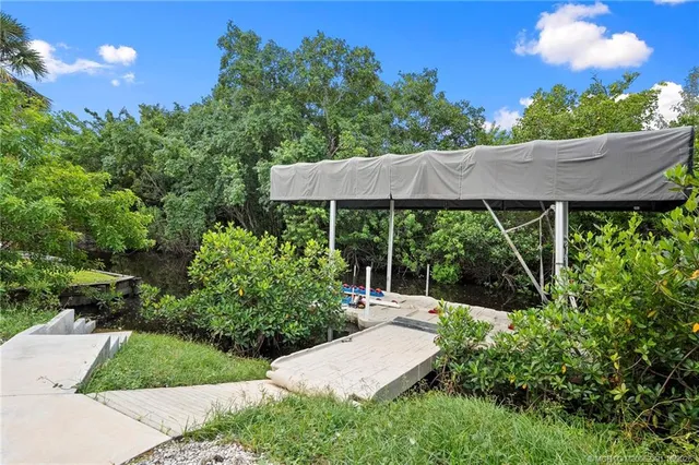 a view of a back yard with green space