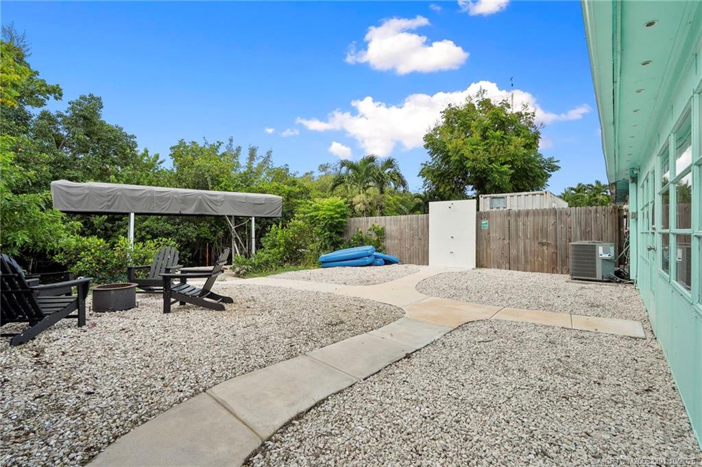30 Southwest Hideaway Place Stuart, FL 34994 - Photo 39 of 45 a view of outdoor space yard and patio
