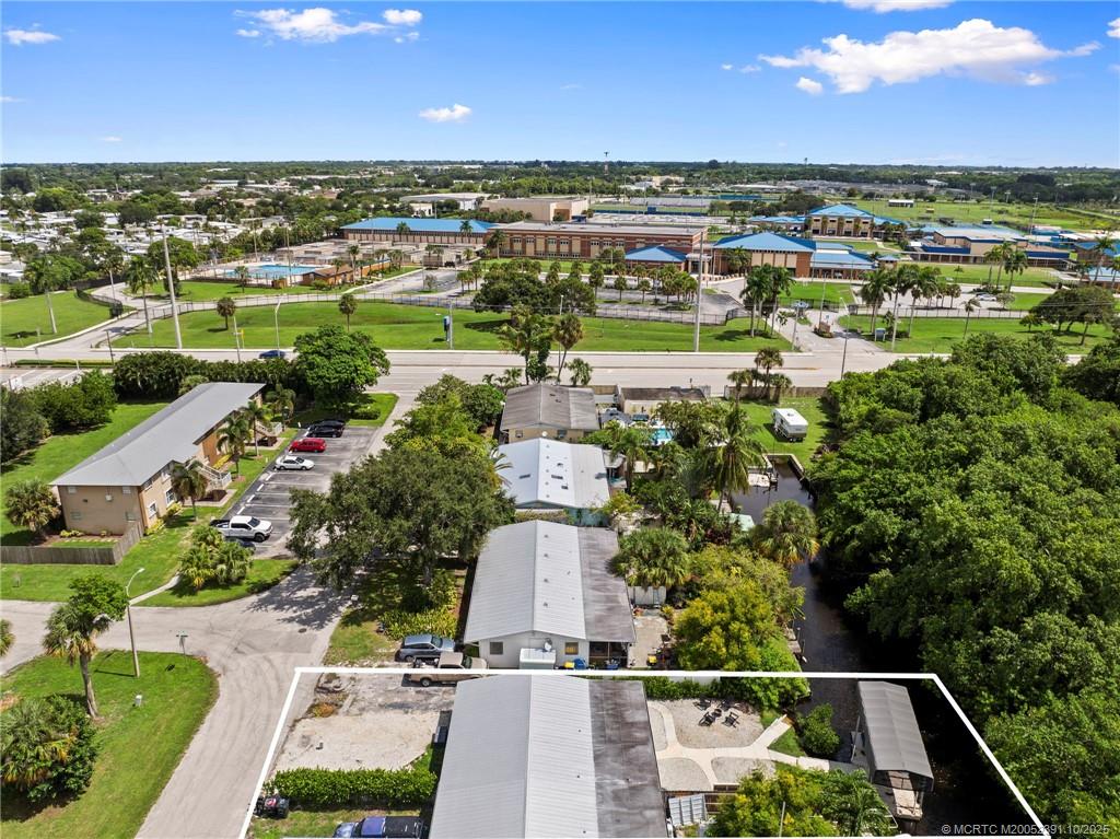30 Southwest Hideaway Place Stuart, FL 34994 - Photo 43 of 45 an aerial view of residential houses with outdoor space and ocean view