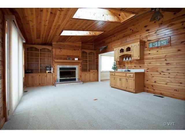 2936 Birch Road Homewood, IL 60430 - Photo 5 of 11 a view of a kitchen with furniture and fireplace