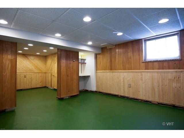 2936 Birch Road Homewood, IL 60430 - Photo 6 of 11 a view of an empty room with wooden floor and a window