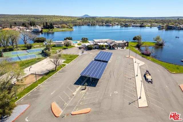 an aerial view of a houses with outdoor space