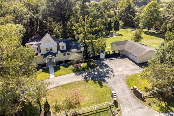 swimming pool view with a seating space