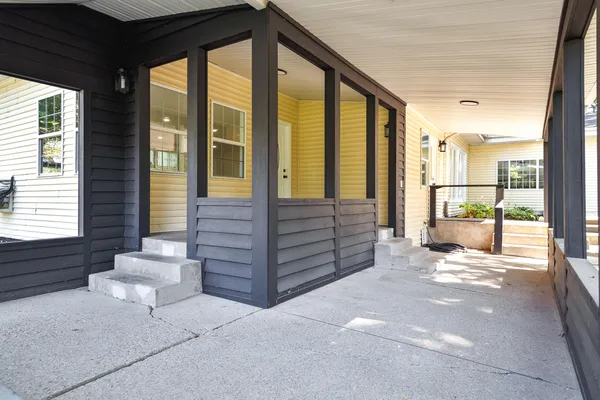 a view of front door and bedroom