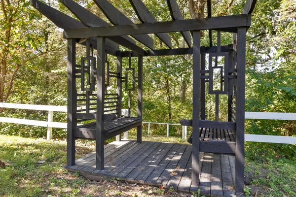 a view of a bench in the porch
