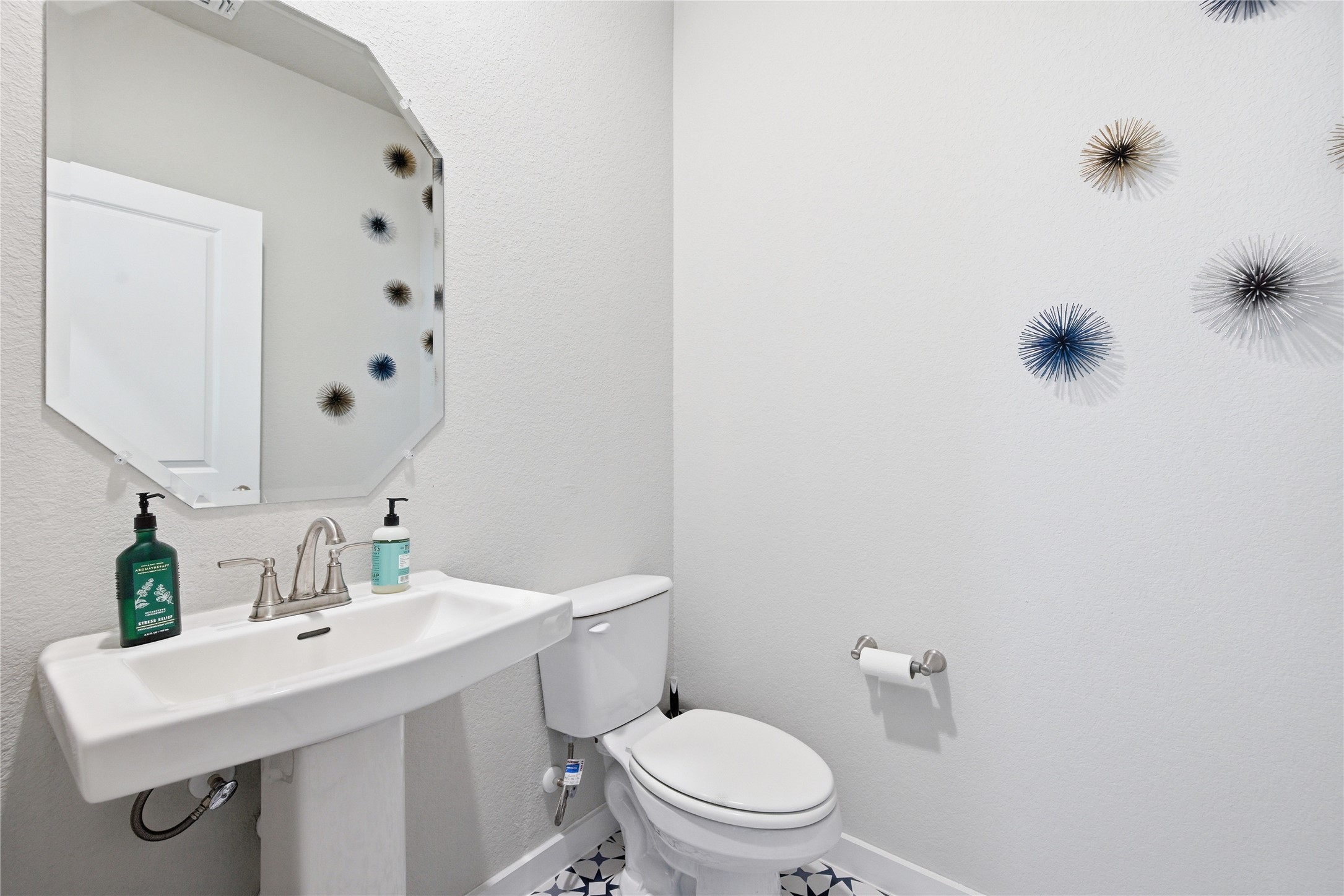 1008 Summer Glen Georgetown, TX 78628 - Photo 11 of 34 a bathroom with a sink mirror vanity and toilet