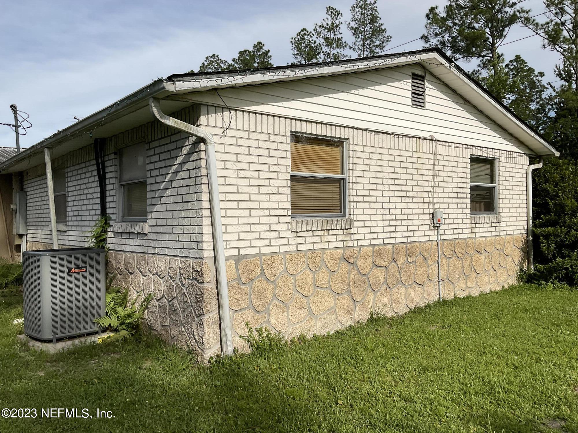 1365 US 90 Macclenny, FL 32063 - Photo 3 of 16 a view of a house with a yard