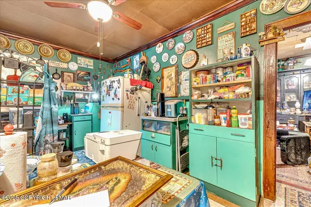 a view of a chairs and table in a balcony