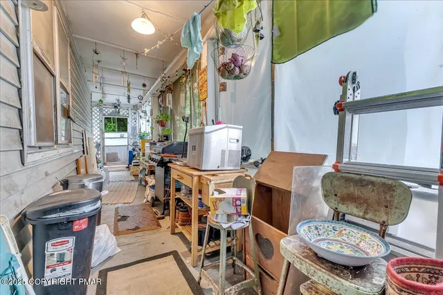 a bedroom with furniture and a bed