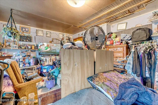 a utility room with a washing machine