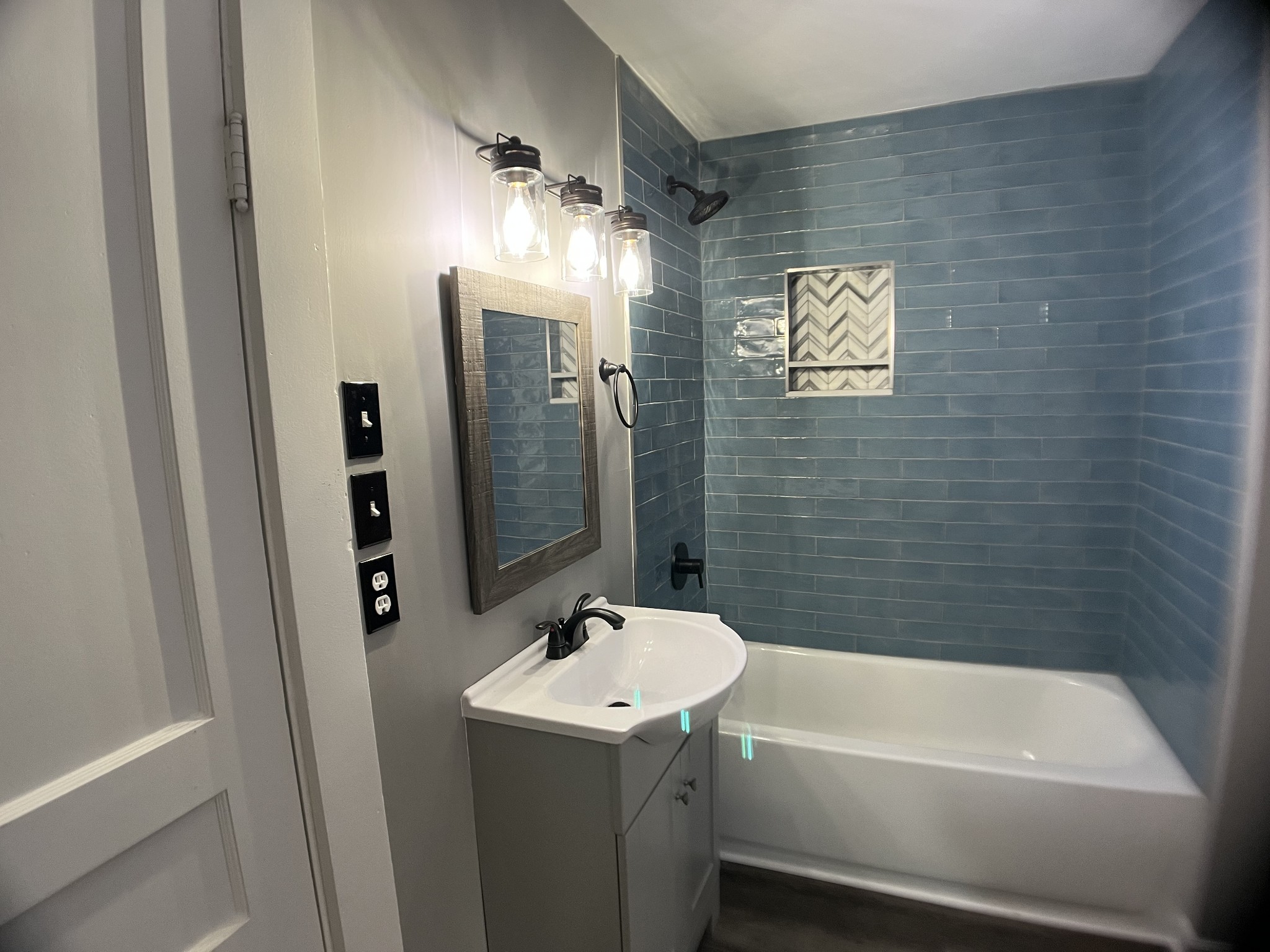 124 Arnold Lane Murfreesboro, TN 37127 - Photo 5 of 14 a bathroom with a sink a toilet and shower