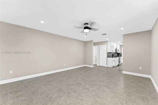 a view of a back yard of the house