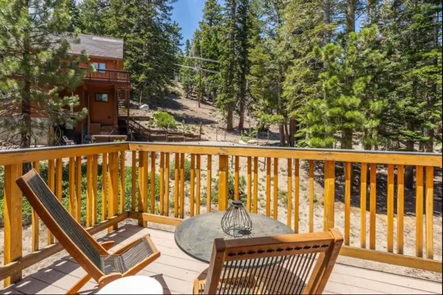 a view of roof deck with furniture