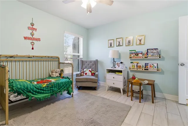 a view of a livingroom with furniture and toys