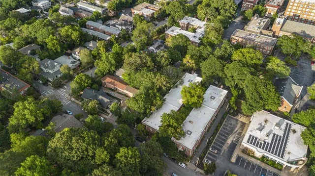 a view of a house with a tree