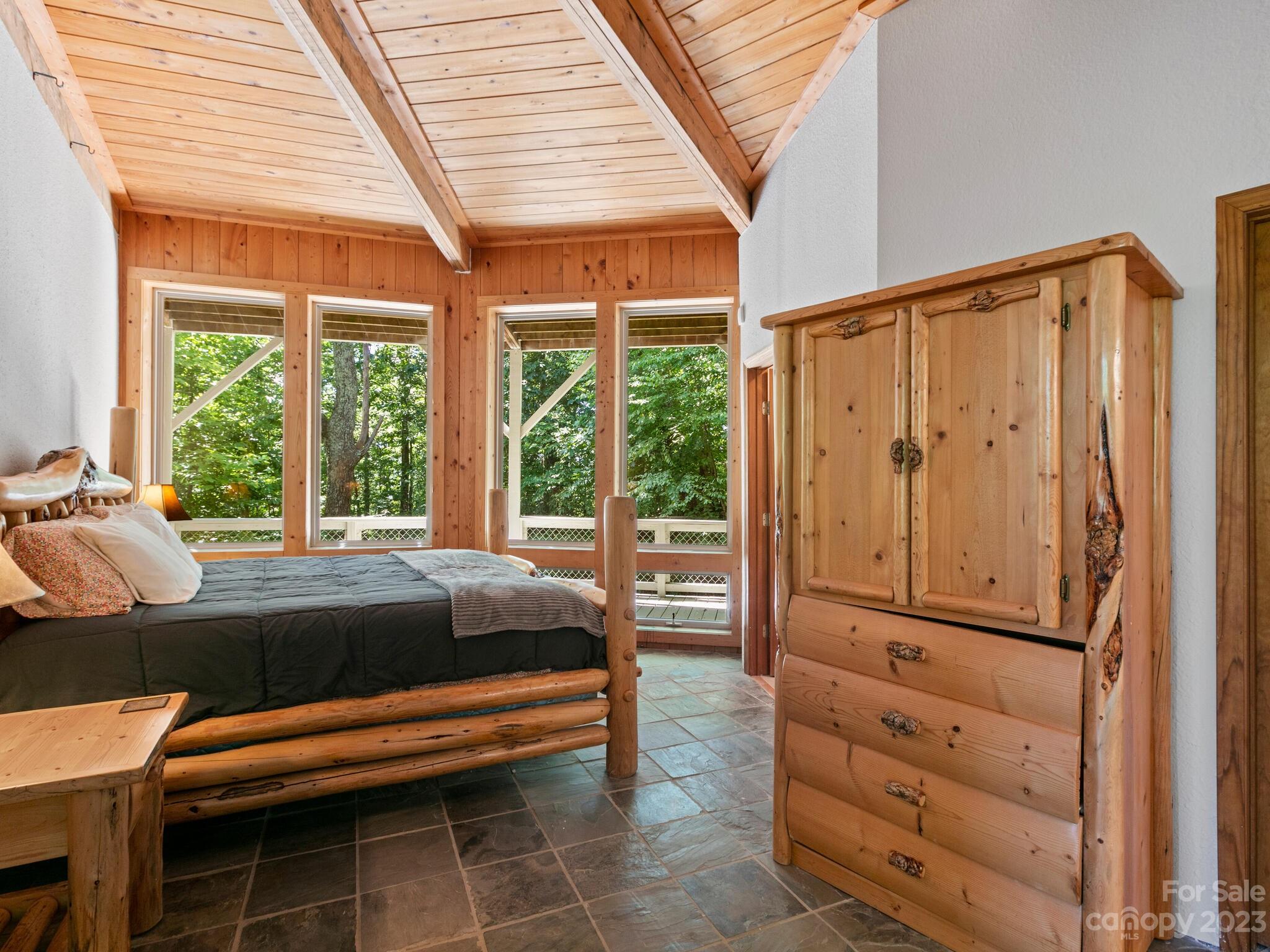 39 Rising Sun Road Candler, NC 28715 - Photo 30 of 41 a room with furniture and a window