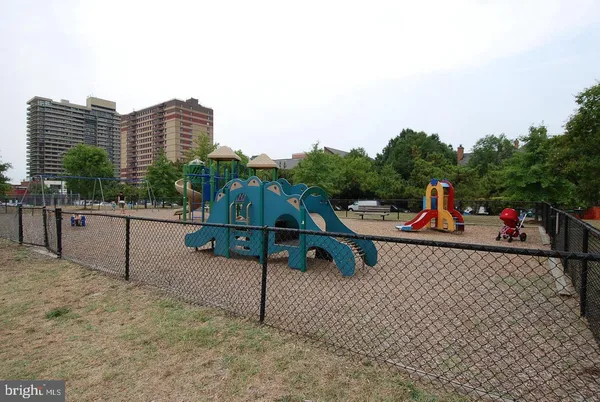 a view of a park with swings