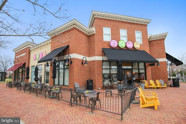 a view of a street with a building on the road
