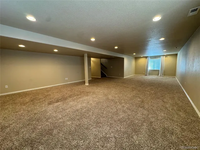 an empty room with an entryway