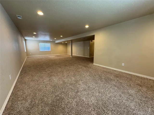 an empty room with a natural light