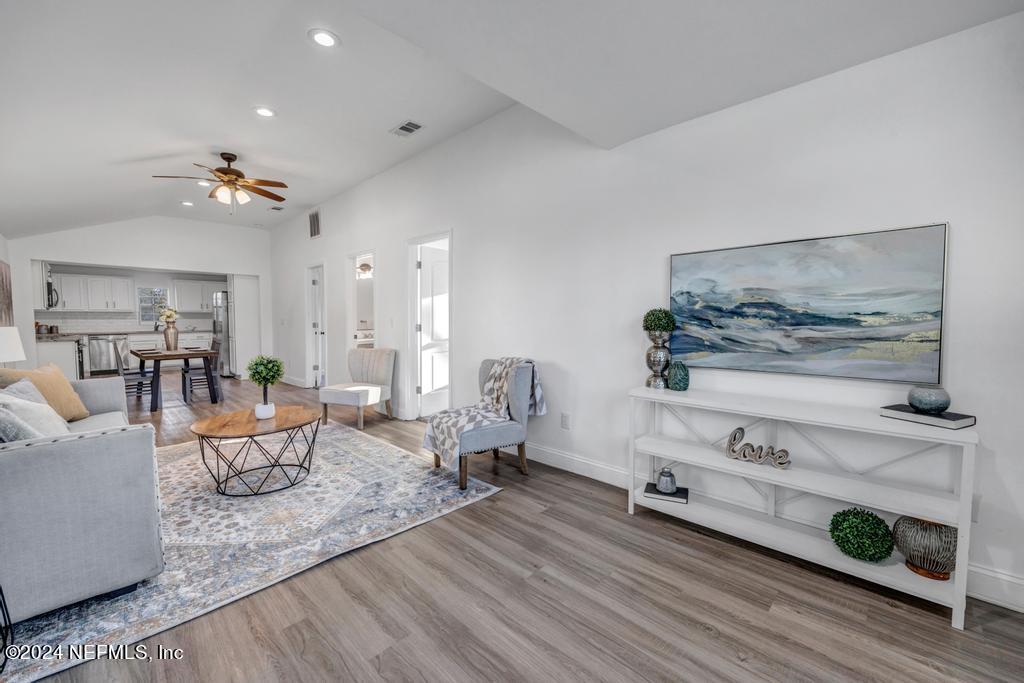 4623 Ribault Park Street Jacksonville, FL 32233 - Photo 3 of 30 a living room with furniture and wooden floor