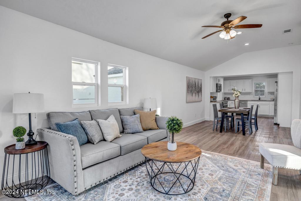 4623 Ribault Park Street Jacksonville, FL 32233 - Photo 6 of 30 a living room with furniture and wooden floor