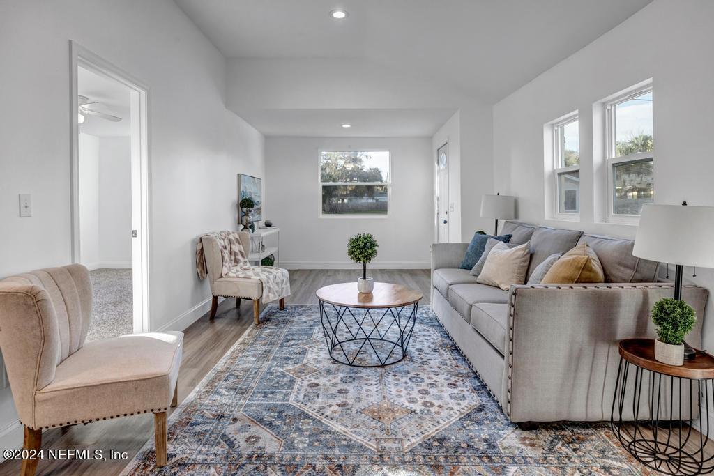 4623 Ribault Park Street Jacksonville, FL 32233 - Photo 8 of 30 a living room with furniture and wooden floor