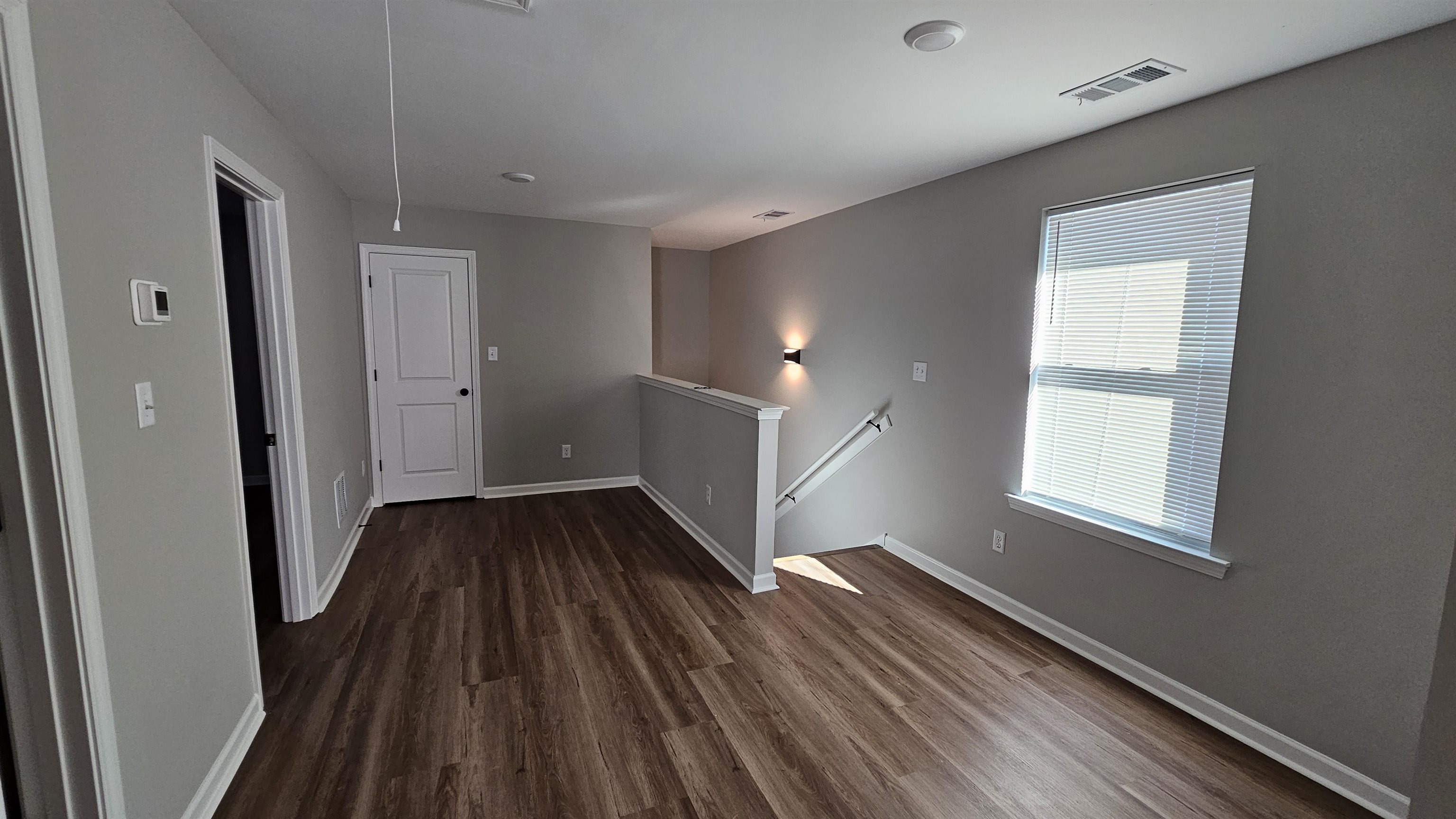 2234 East Alcy Road Memphis, TN 38114 - Photo 13 of 23 a view of hallway with wooden floor