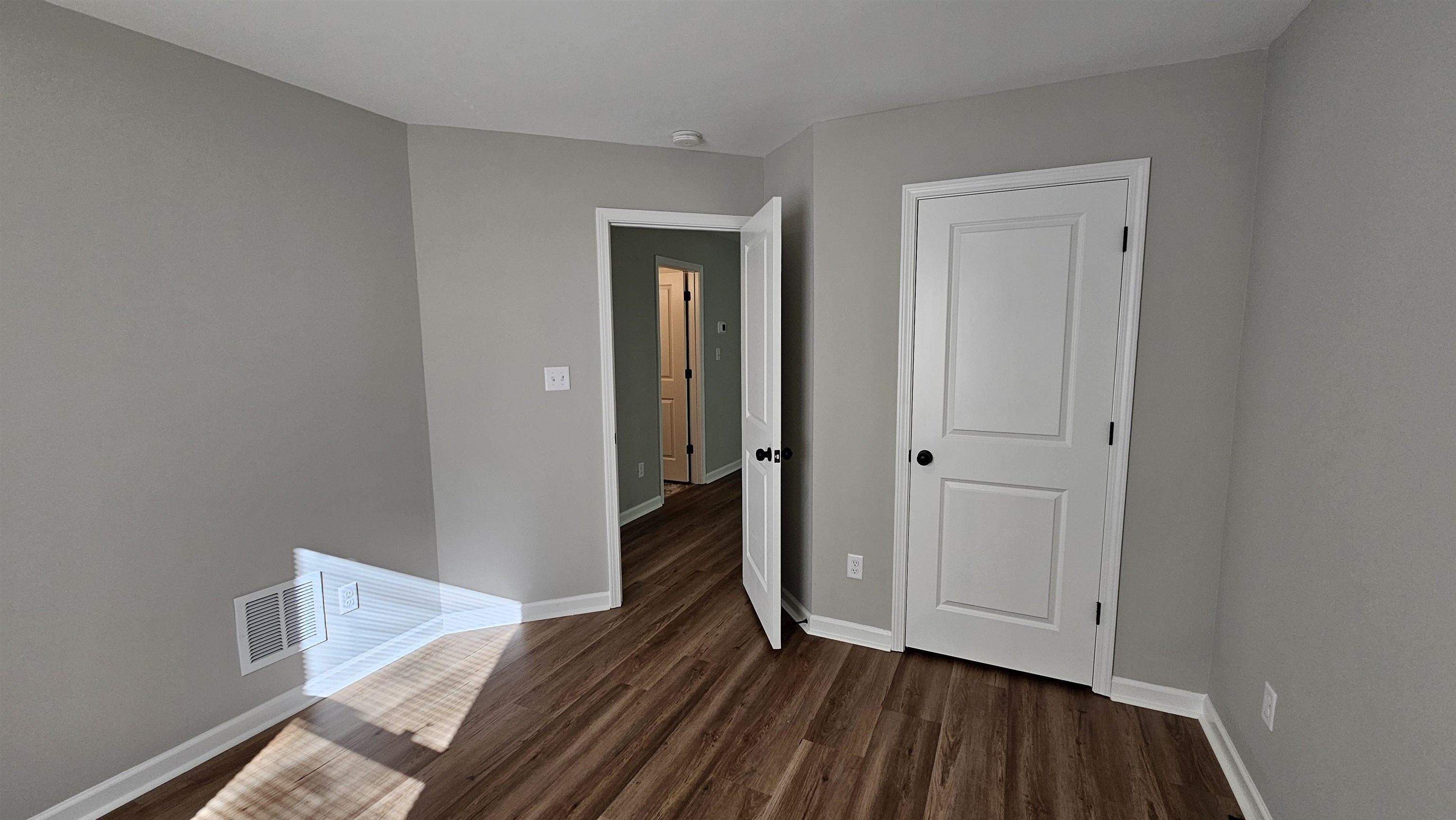 2234 East Alcy Road Memphis, TN 38114 - Photo 16 of 23 a view of an empty room and wooden floor