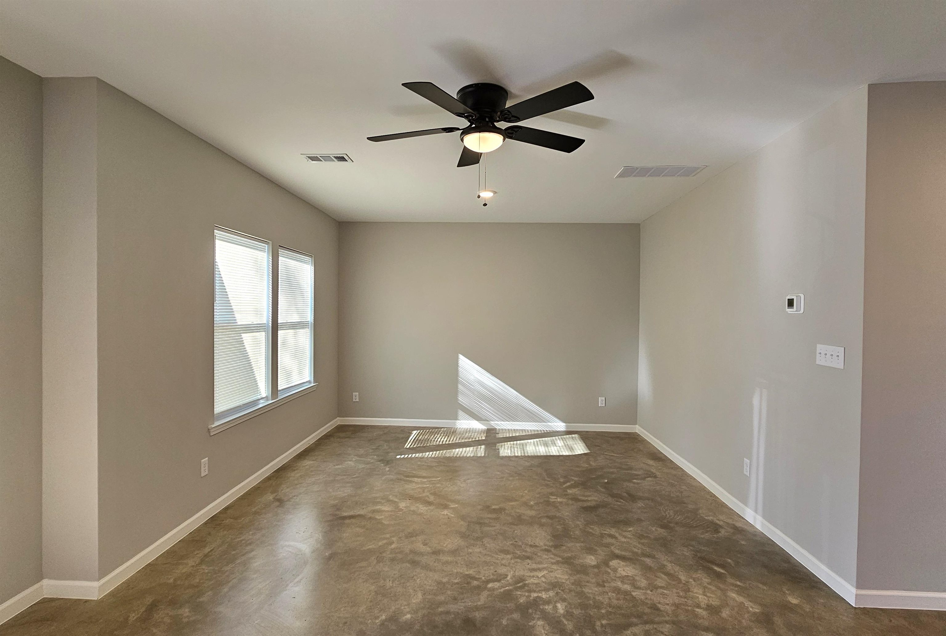 2234 East Alcy Road Memphis, TN 38114 - Photo 6 of 23 a view of an empty room with a window