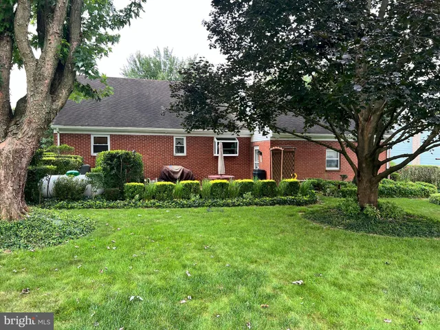front view of house with a yard