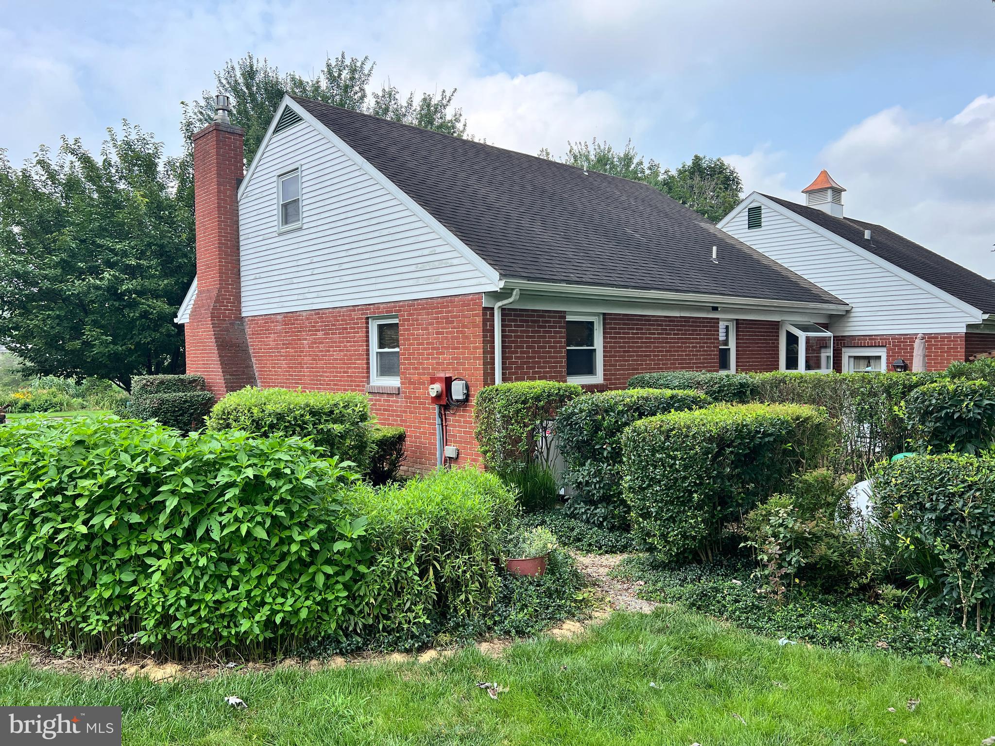 51 South Snyder Street Manheim, PA 17545 - Photo 6 of 32 a front view of a house with a yard