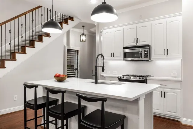 a living room with furniture fireplace and flat screen tv