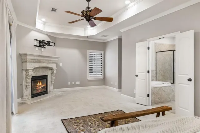 a bathroom with a tub sink a mirror a shower and vanity