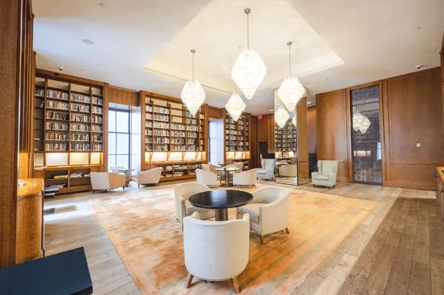 a large living room with large windows