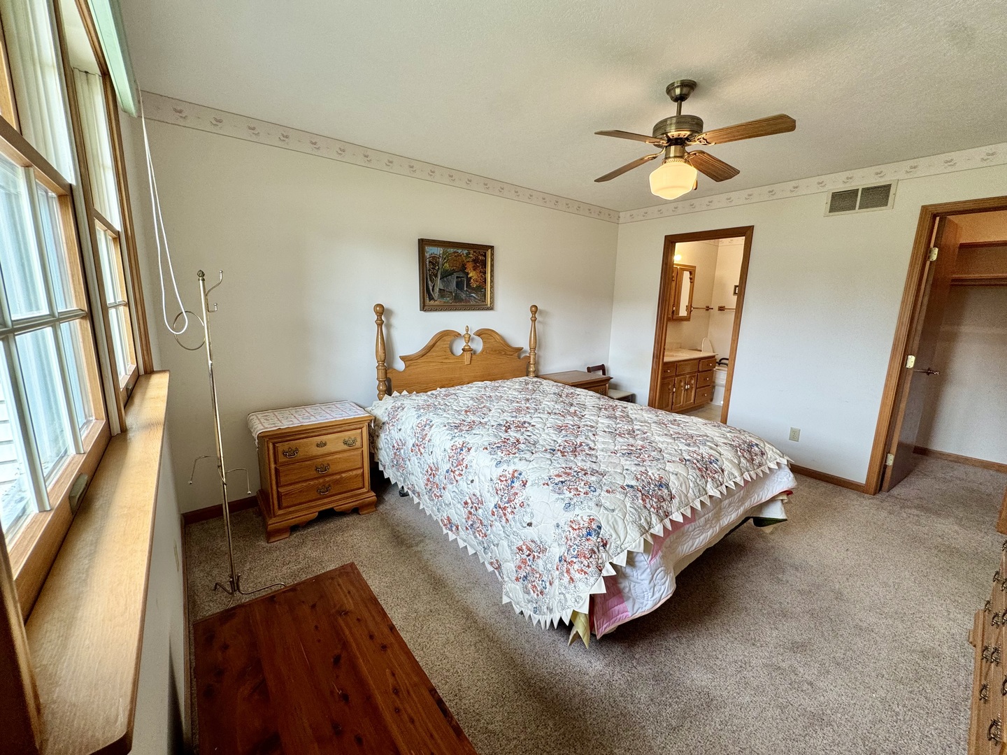 31 Colonial Drive Clinton, IL 61727 - Photo 13 of 24 a bedroom with a bed and wooden floor