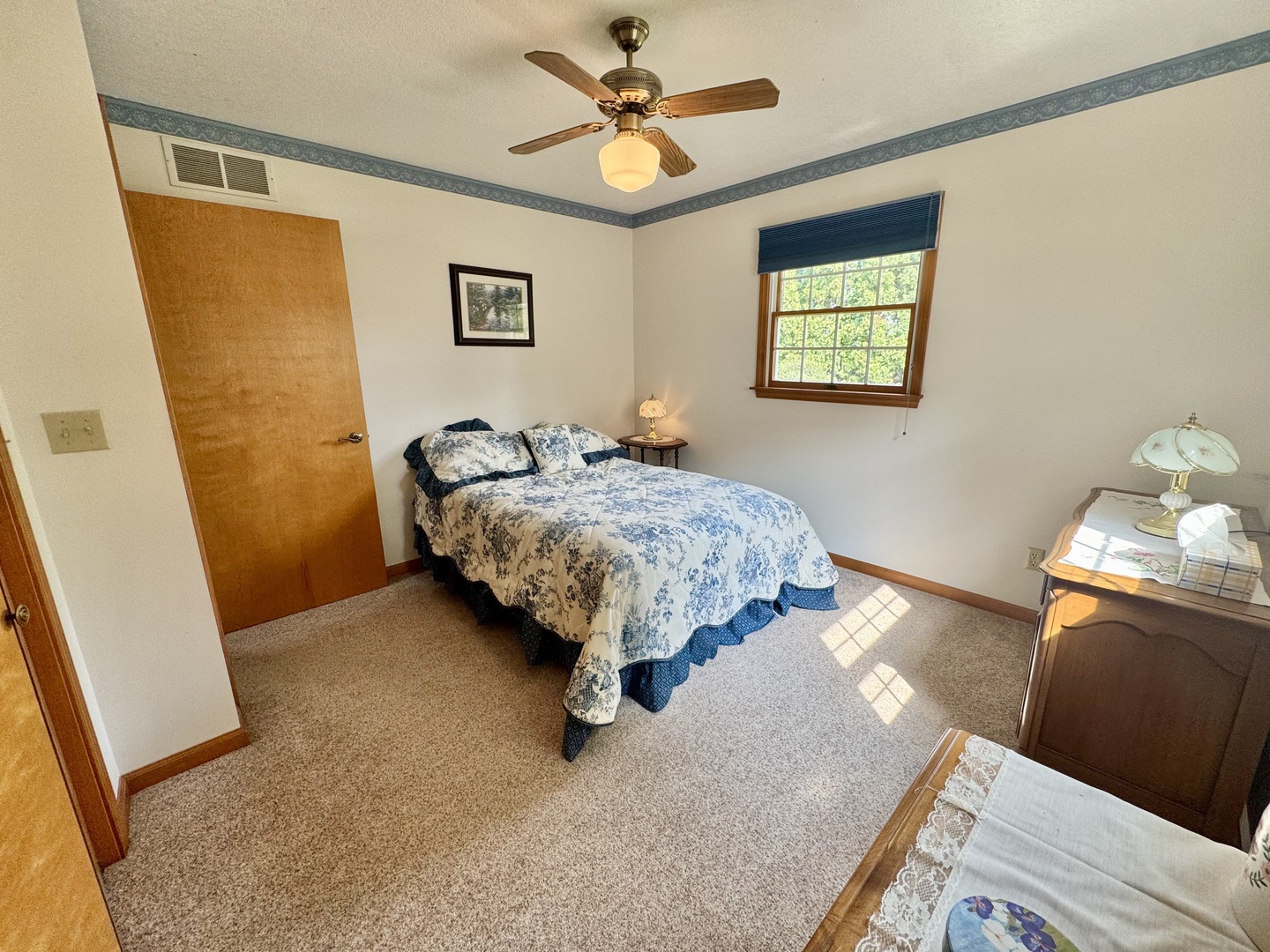 31 Colonial Drive Clinton, IL 61727 - Photo 23 of 24 a bedroom with a bed and a window