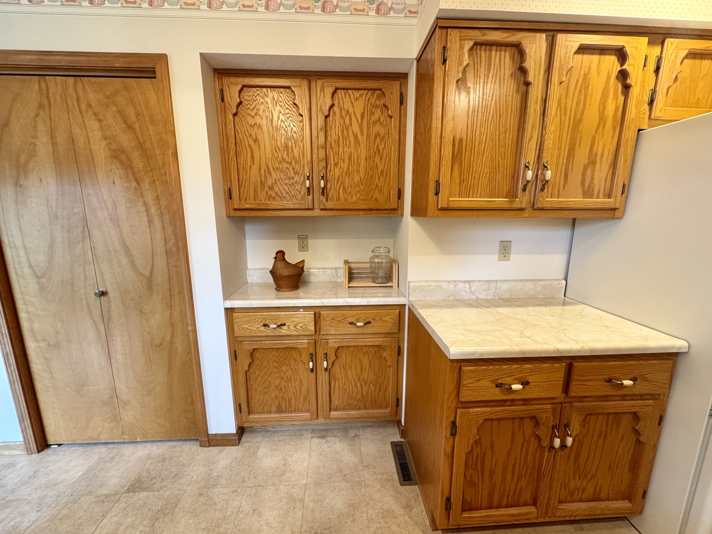 31 Colonial Drive Clinton, IL 61727 - Photo 10 of 24 a kitchen with stainless steel appliances granite countertop a refrigerator and a stove top oven