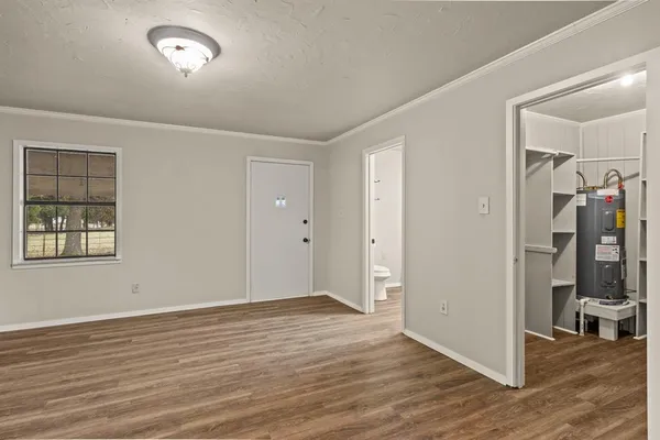 a view of livingroom with hardwood floor and hallway