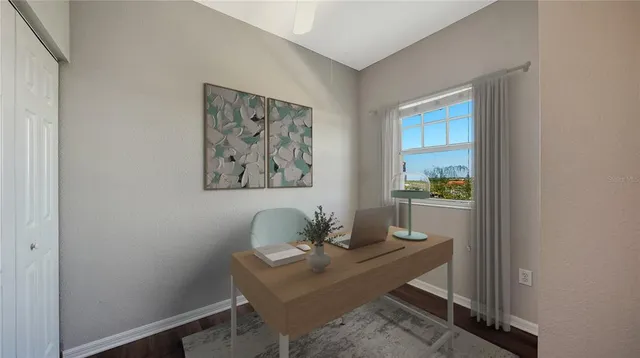 a workspace with furniture and window