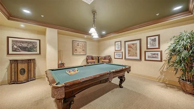 a room with furniture and a chandelier