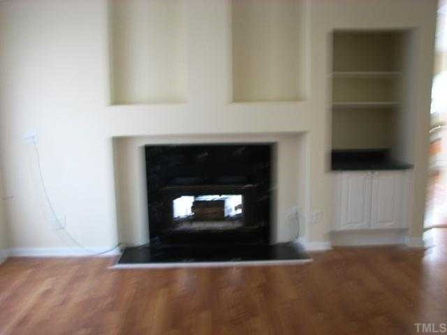 817 Red Mountain Road Rougemont, NC 27572 - Photo 5 of 12 Fireplace on one side the living room and the family room on the other. Living Room