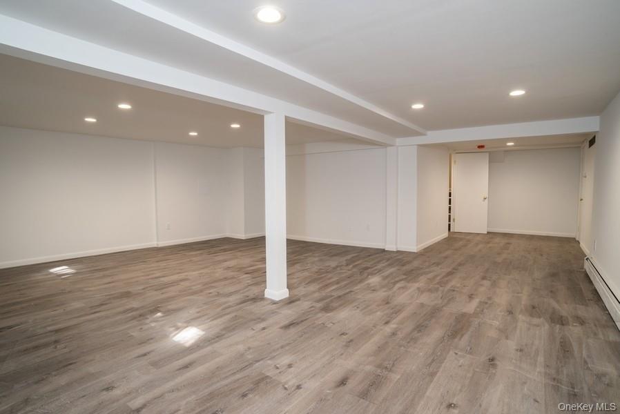 17 Vista Drive Great Neck, NY 11021 - Photo 18 of 20 Finished below grade area featuring recessed lighting and wood finished floors