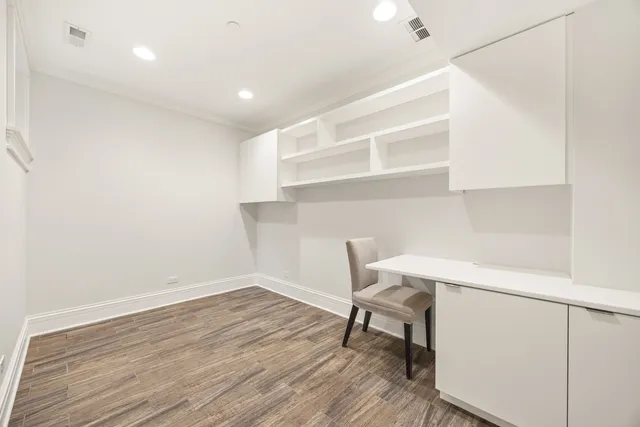 a workspace with wooden floor