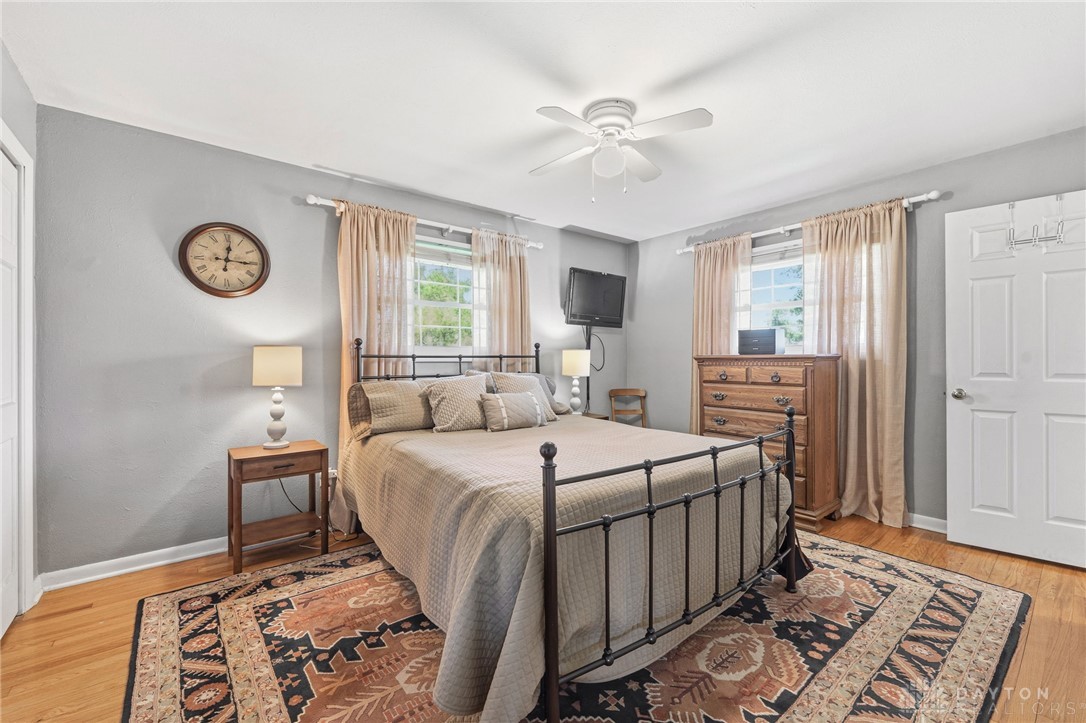 2945 Ashlar Drive Springfield, OH 45503 - Photo 10 of 20 This cozy bedroom features warm wooden floors and ample natural light, perfect for peaceful repose.