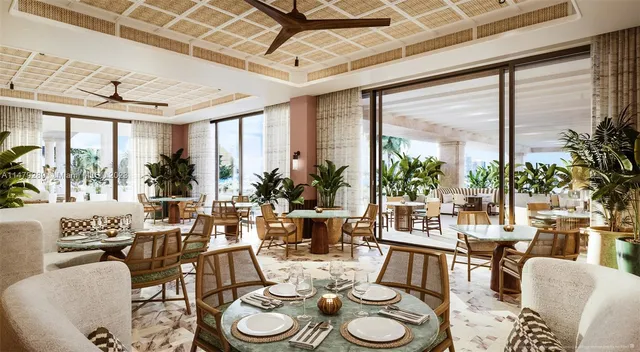 a view of a dining room with furniture large windows and wooden floor