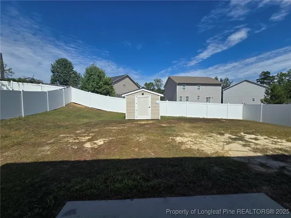 a view of a pool with an outdoor space