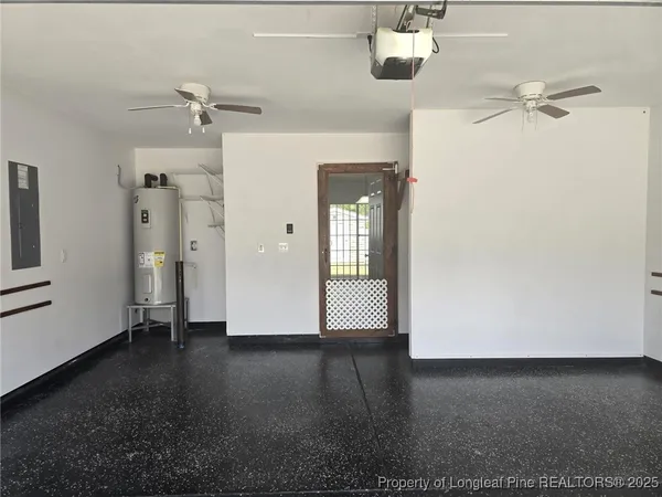 an empty room with a empty space and windows