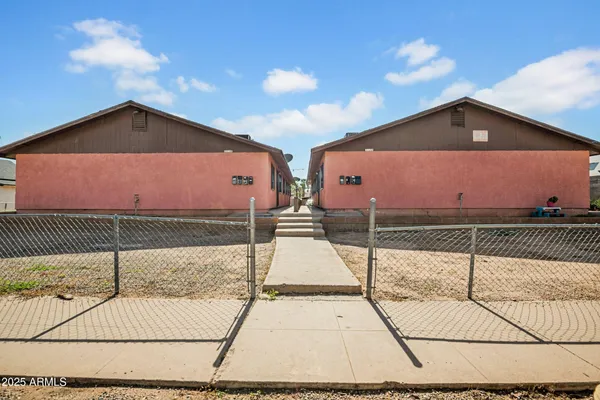 a front view of a house with a garage