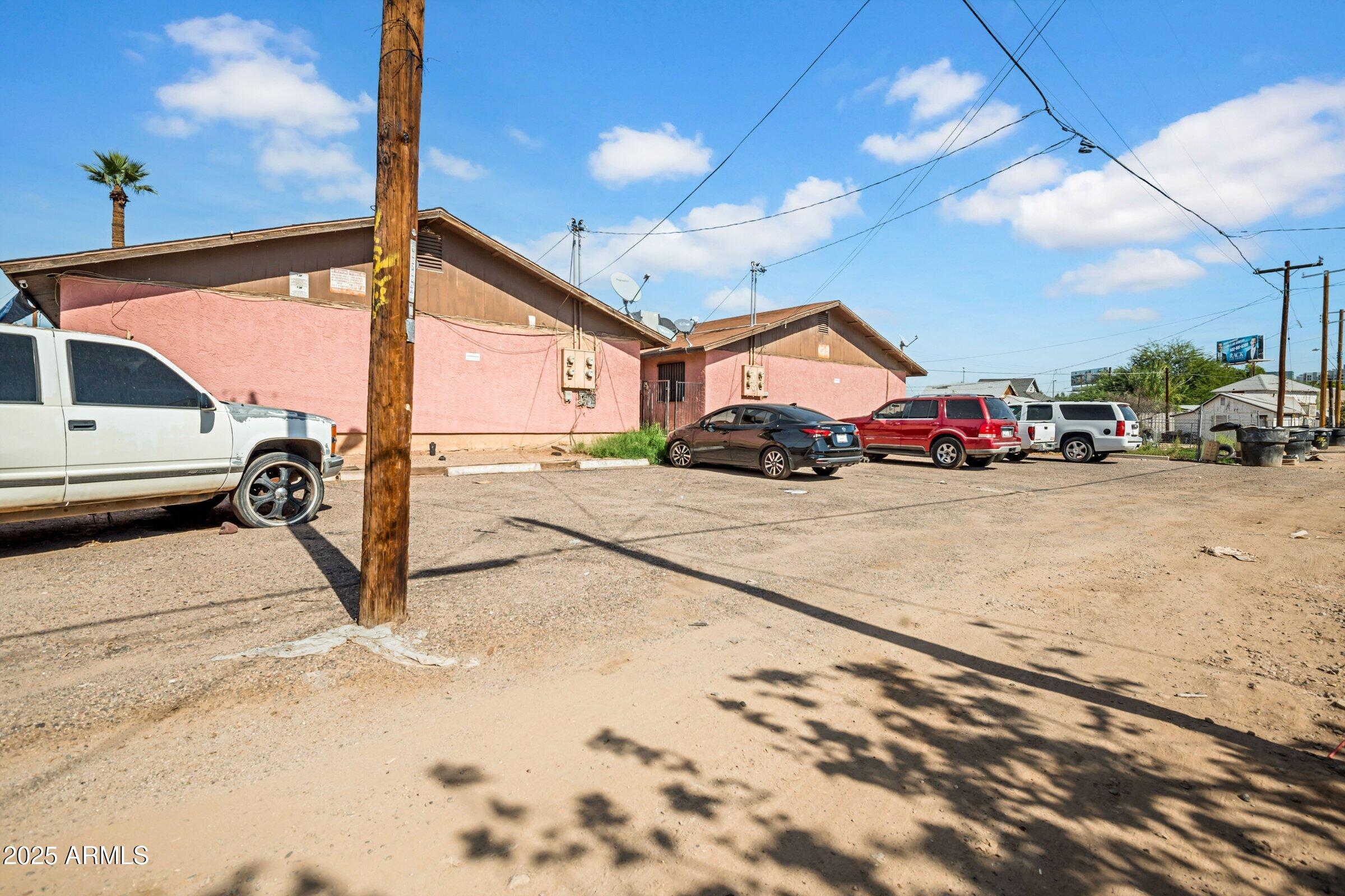 1123 West Fillmore Street Phoenix, AZ 85007 - Photo 19 of 20 a view of a street with car parked